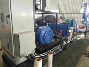 Industrial pump packaging skid with motor, control panel, piping, and instrumentation assembled for reliable fluid transfer applications.