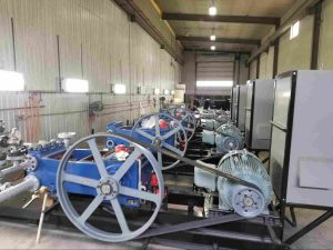 Custom pump packages for oil and gas assembled on industrial skids.